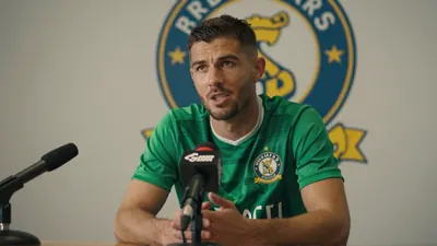 Learn about the former Linfield player's decision to join Ballymena United, with Linfield currently 11 points behind...